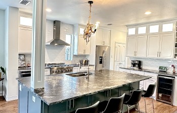 Beautiful Kitchen Remodel in Crown Valley by Stanton and Company featuring new Island and new countertops and cabinets